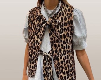 Gilet con stampa leopardata, gilet con lacci con fiocco, canotta ampia senza maniche da donna, abbigliamento da donna per ufficio alla moda primaverile, capispalla estivi