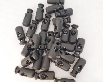 1 / 10pcs plastic Cord Lock Stopper Fastener Spring Toggle Clip Clamp for 3mm Cord Drawstring Rope Black