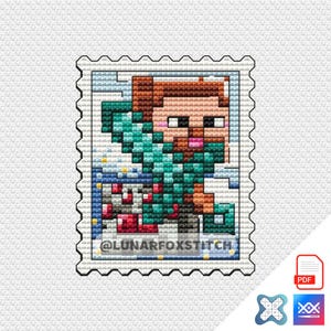 Könnte beinhalten: Kreuzstichmuster mit einem pixeligen Charakter mit einer türkisfarbenen Waffe und einer kleinen Kreatur. Das Design ist in einem Briefmarkenrahmen eingefasst. Der Text "@LUNARFOXSTITCH" ist unten sichtbar. Das Design befindet sich auf weißem Hintergrund.