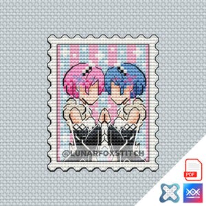 May include: Cross-stitch pattern featuring two anime-style characters with pink and blue hair, set within a postage stamp design. The image includes the text "@LUNARFOXSTITCH" and is set against a light blue fabric background. Includes a PDF icon.