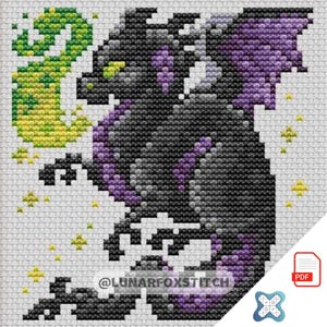 May include: Cross-stitch pattern of a dragon with black, purple, and gray scales, green eyes, and yellow accents. The dragon is set against a white background with a green and yellow flame-like design. The text "@LUNARFOXSTITCH" is visible.