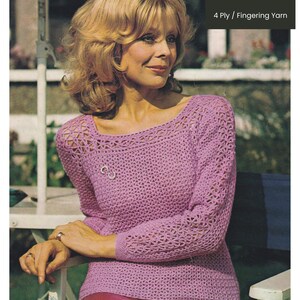 May include: A vintage crochet pattern for a lilac sweater with a square neckline and long sleeves. The pattern includes three sizes: 86, 91, and 97 cm. The yarn is 4 Ply / Fingering Yarn. The image shows a woman wearing the sweater.