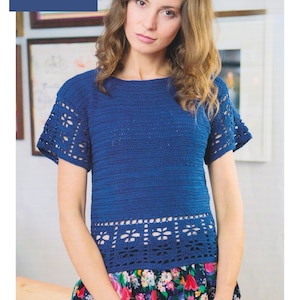 May include: A blue crocheted top with a lacy trim. The top has short sleeves and a round neckline. CROCHET 4 Ply / Fingering Yarn 28/30 to 40/42 inch.