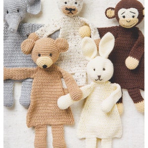 May include: Crochet pattern for flat animal toys. The pattern includes a brown bear, a white rabbit, a brown monkey, a tan cat, and a gray elephant. The pattern is for DK/8 ply yarn.