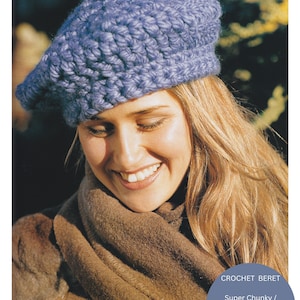 May include: A close-up of a woman wearing a blue crocheted beret. The beret is made with super chunky yarn. The text "CROCHET BERET" is visible in the image. The text "Super Chunky / Super Bulky Yarn" is visible in the image. The text "Sirdar Bigga" is visible in the image.