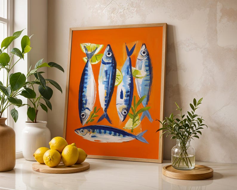 a vibrant painting of fish on an orange background, surrounded by various decorative elements such as a vase of green leaves, a bowl of lemons, and a potted plant.