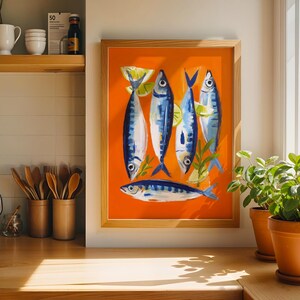 a kitchen counter with a framed painting of blue and white fish, a shelf with various kitchen items, and potted plants.