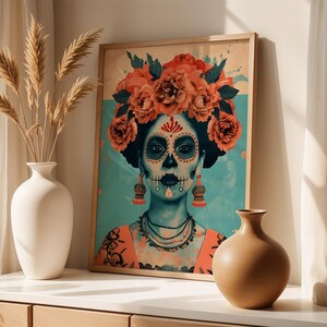 a framed artwork depicting a woman with a skull-like face, adorned with a floral headpiece, placed on a shelf next to two vases.