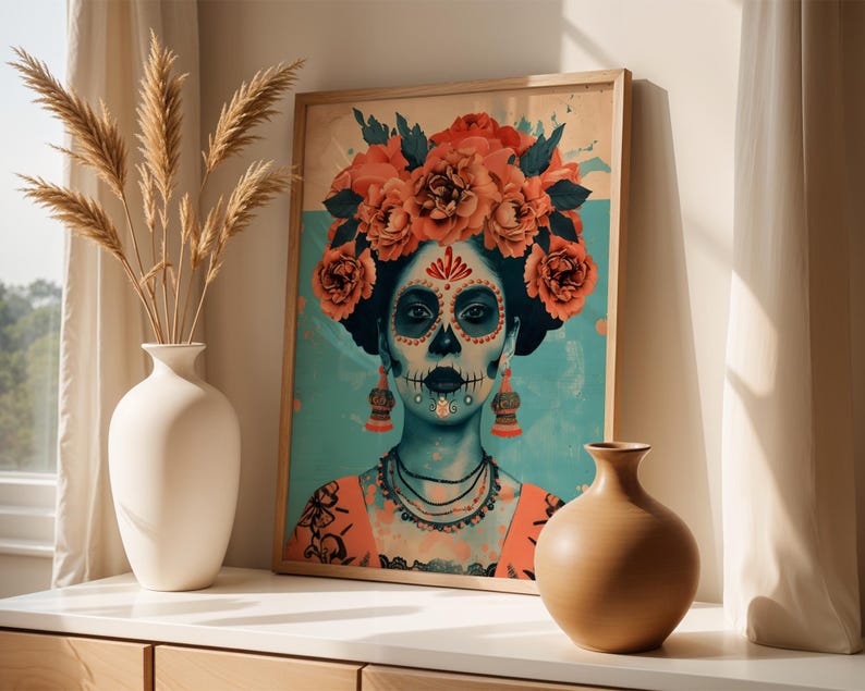 a framed artwork depicting a woman with a skull-like face, adorned with a floral headpiece, placed on a shelf next to two vases.