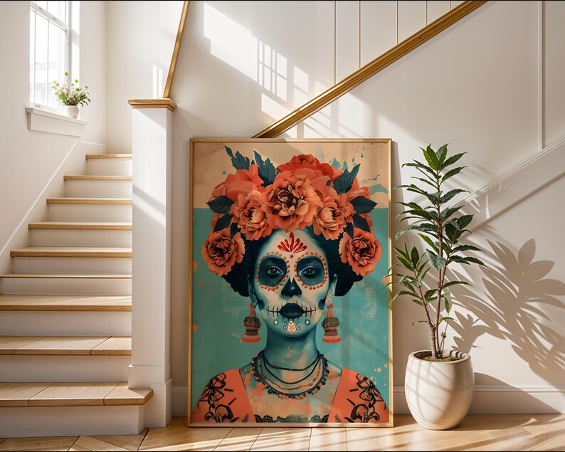 a large framed artwork depicting a colorful, stylized portrait of a woman with a skull-like face, adorned with flowers and intricate patterns. The artwork is displayed in a hallway with a staircase and a potted plant nearby.