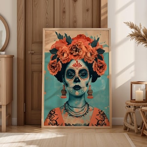 a large framed poster of a woman with a skull design on her face, wearing a headdress with flowers, and a colorful, artistic style.
