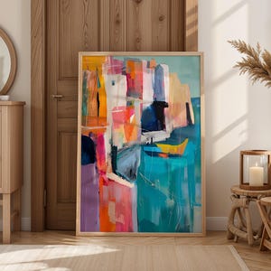a large abstract painting with vibrant colors and dynamic brushstrokes, displayed in a room with a wooden door and a window.