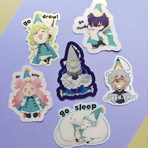 May include: A collection of five die-cut vinyl stickers featuring anime-style characters in pointed hats. Text includes 'go draw!', 'go study', 'go play', 'go sleep', and 'QUEER-FREY'. One sticker depicts a central figure with a large eye mask.