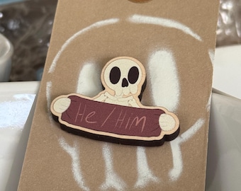 He/him pronouns pin badge