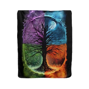 May include: A black blanket with a colourful illustration of a tree split into four quadrants. The top shows a purple nebula and a starry night with a full moon. The bottom shows a green landscape and orange flames.