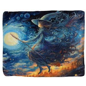 May include: A blanket featuring a whimsical illustration of a witch flying on a broomstick. The witch is depicted with long, flowing hair and a hat, set against a backdrop of a moonlit sky, stars, and a cityscape. The color palette includes blues, oranges, and yellows.