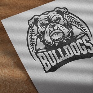May include: Black and white illustration of a bulldog's head with the word "Bulldogs" in a stylized font.