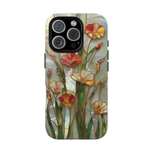 May include: A smartphone case featuring a stained glass style floral design on a pearlescent background. The artwork displays red, orange, and cream-coloured flowers with green stems and leaves, all outlined in thin gold lines, creating a mosaic effect.