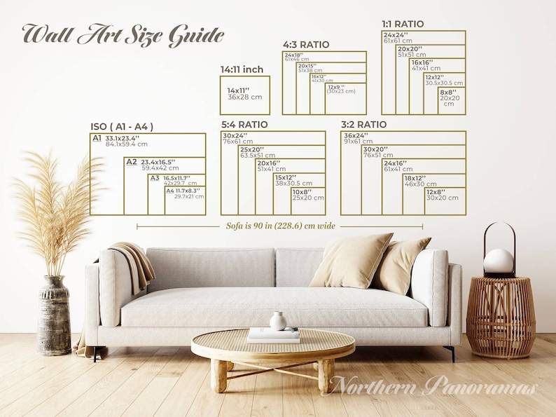 May include: A guide to wall art sizes with different aspect ratios, including 1:1, 4:3, 5:4, and 3:2. The guide shows the dimensions in inches and centimeters for each ratio, with examples of common sizes. The text "Sofa is 90 in (228.6) cm wide" is also included.
