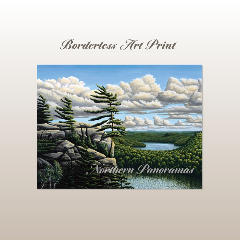 May include: A painting of a scenic landscape with a lake and forest in the distance. The foreground features a rocky cliff with trees growing on it. The sky is blue with white clouds. The painting is titled "Northern Panoramas" and is labeled as a "Borderless Art Print".
