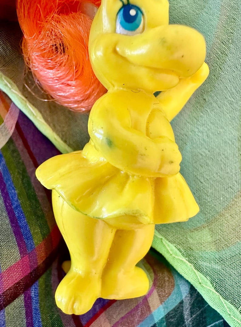 May include: A set of three ceramic mugs with a speckled, matte finish. The mugs are in shades of cream, light gray, and dark gray. Each mug has a simple, minimalist design, perfect for coffee or tea.