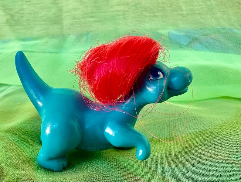 May include: A white ceramic mug with a black handle and the text "But First, Coffee" in a bold, black font. The mug sits on a white surface, showcasing its clean design. Perfect for coffee or tea.