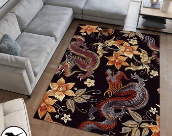 May include: A black area rug with a repeating pattern of gold and red dragons and floral designs. The rug has a dark background with intricate details.