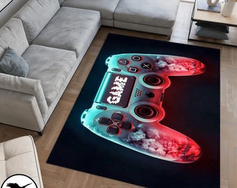 Puede incluir: Una alfombra de controlador de juegos azul y rojo con un diseño de galaxia y la palabra "GAME" en el controlador.