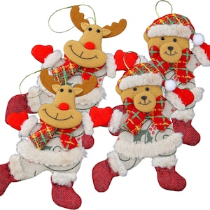 Lindos muñecos navideños de renos y osos.