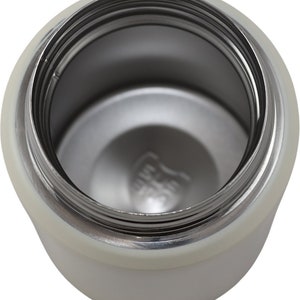 May include: An overhead view of a white insulated water bottle with a stainless steel interior. The bottle's opening reveals the threaded neck and the interior base. The bottle is designed to keep beverages cold or hot.