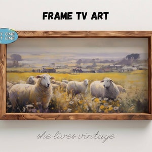 May include: A framed painting of a rural landscape with sheep in a field of yellow wildflowers. The frame is made of rustic wood and has a light brown finish. The text "she lives vintage" is printed below the frame.