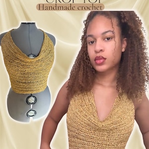 May include: Gold cowl neck crop top, handmade crochet. The top is a halter style with a deep cowl neckline. The top is a metallic gold color and appears to be made of a knitted or crocheted material. The text "Gold Cowl Neck Crop Top" is at the top of the image.