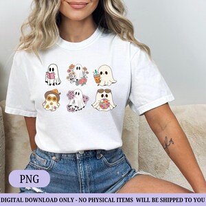 May include: White t-shirt featuring a collection of cartoon ghosts, each with unique accessories and expressions. One ghost reads a book, another is surrounded by flowers, and another holds a drink. The shirt has the text "PNG" at the bottom.