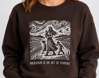 Sweatshirt Migration Is An Act of Courage: Immigrant Rights Support Crewneck | 8 Colors