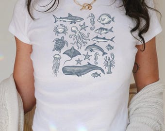Top corto coqueto Y2K: camiseta de bebé con animales del océano