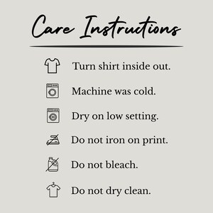 May include: A light gray informational graphic titled Care Instructions with black text and icons. It lists six steps: turn shirt inside out, machine wash cold, dry on low setting, do not iron on print, do not bleach, and do not dry clean.