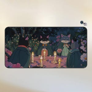 May include: Four black cats wearing cloaks gather around a table with lit candles in a forest setting. The cats are sitting around a table with a pink tablecloth and lit candles. The scene is reminiscent of a magical gathering.