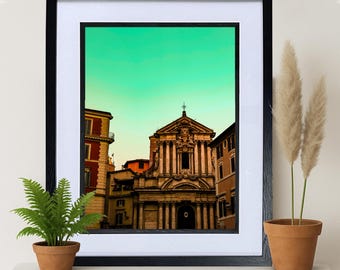Puede incluir: Una fotografía enmarcada de un edificio con un cielo verde en el fondo. El edificio es una iglesia con una gran fachada ornamentada. El edificio está rodeado de otros edificios, algunos de los cuales son más altos que la iglesia.