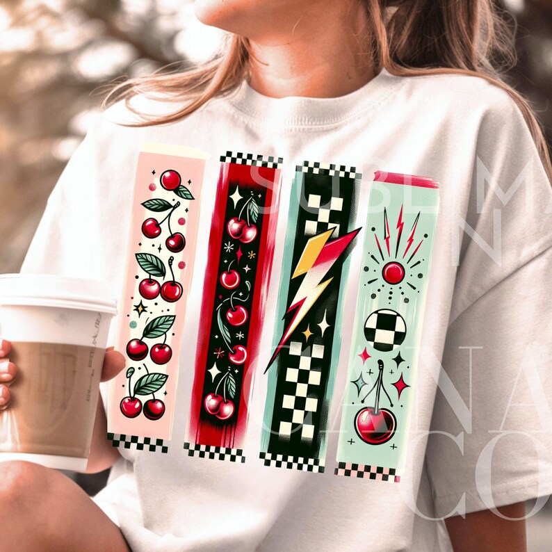 May include: White t-shirt with a graphic design featuring four vertical stripes. The stripes are decorated with cherries, lightning bolts, checkered patterns, and stars.