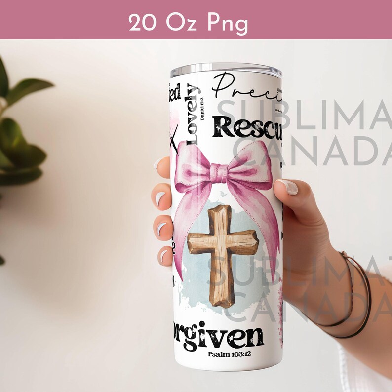 May include: A white 20 ounce tumbler with a watercolour design of a pink bow, a wooden cross, and the words "Precious, Rescued, Loved, Lovely, Forgiven, Psalm 103:12".
