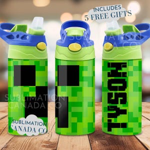May include: Three green water bottles with a Minecraft Creeper design. The bottles have blue lids and a black strap. One bottle has the name "Tyson" printed on it.