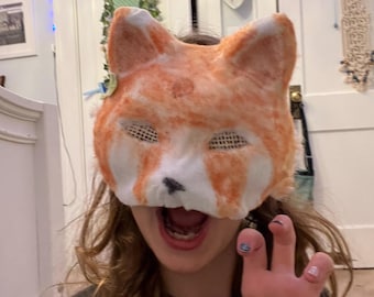 Masker rode Therian-panda