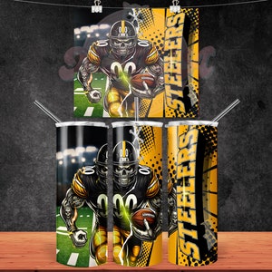 May include: Three stainless steel tumblers with a black and yellow design featuring a football player wearing a helmet and holding a football. The design includes the word "Steelers" repeated on the tumblers.