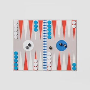 May include: Backgammon board featuring a grey backdrop, red and white triangles, and blue and white counters. Two dice are present, displaying the numbers 2 and 3. The rectangular board has a central dividing line.