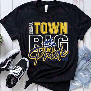 May include: Black t-shirt with a yellow and blue graphic that says "Small Town Big Pride" with an owl mascot.