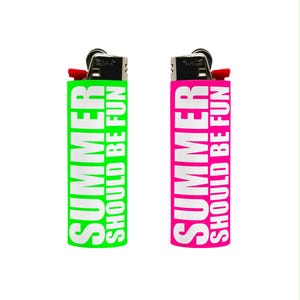 May include: Two lighters, one green and one pink, with the text "SUMMER SHOULD BE FUN" in white. The lighters have a black top with a red ignition button. The background is white with pink and green vertical bars.