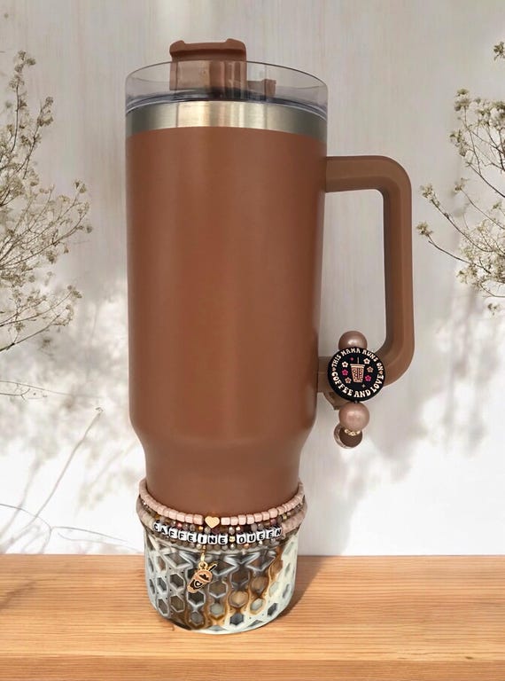 Decorated tumbler, tumbler charms and accessories