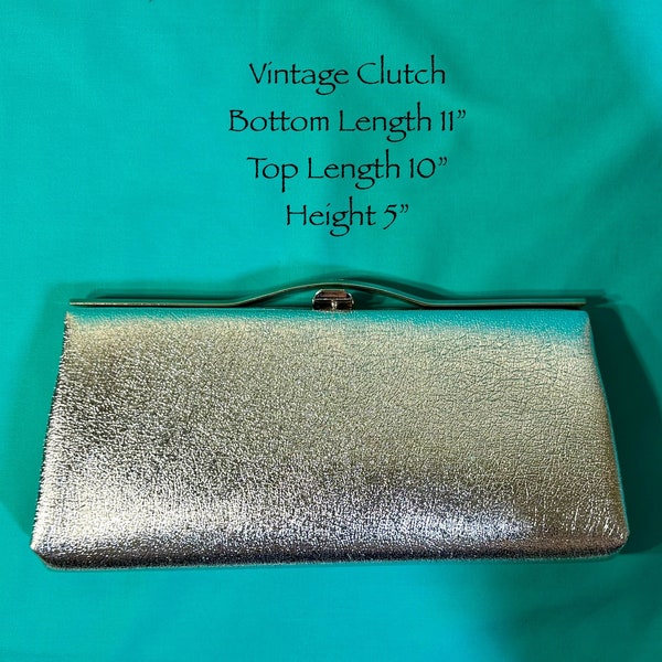 Vintage 1960’s Silver Metallic Leather grain texture Evening Clutch Purse Clasp Lock Metal Handle and hinged bracket opening sculpted handle