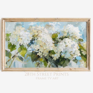May include: A framed painting of white hydrangeas with green leaves against a blue and white background. The painting is in a light wood frame.
