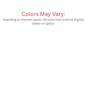 May include: A white informational sign with red text that reads Colors May Vary: followed by black text that states Depeding on filament spool, the colour hue could be slightly darker or lighter. The sign provides a disclaimer regarding product colour.